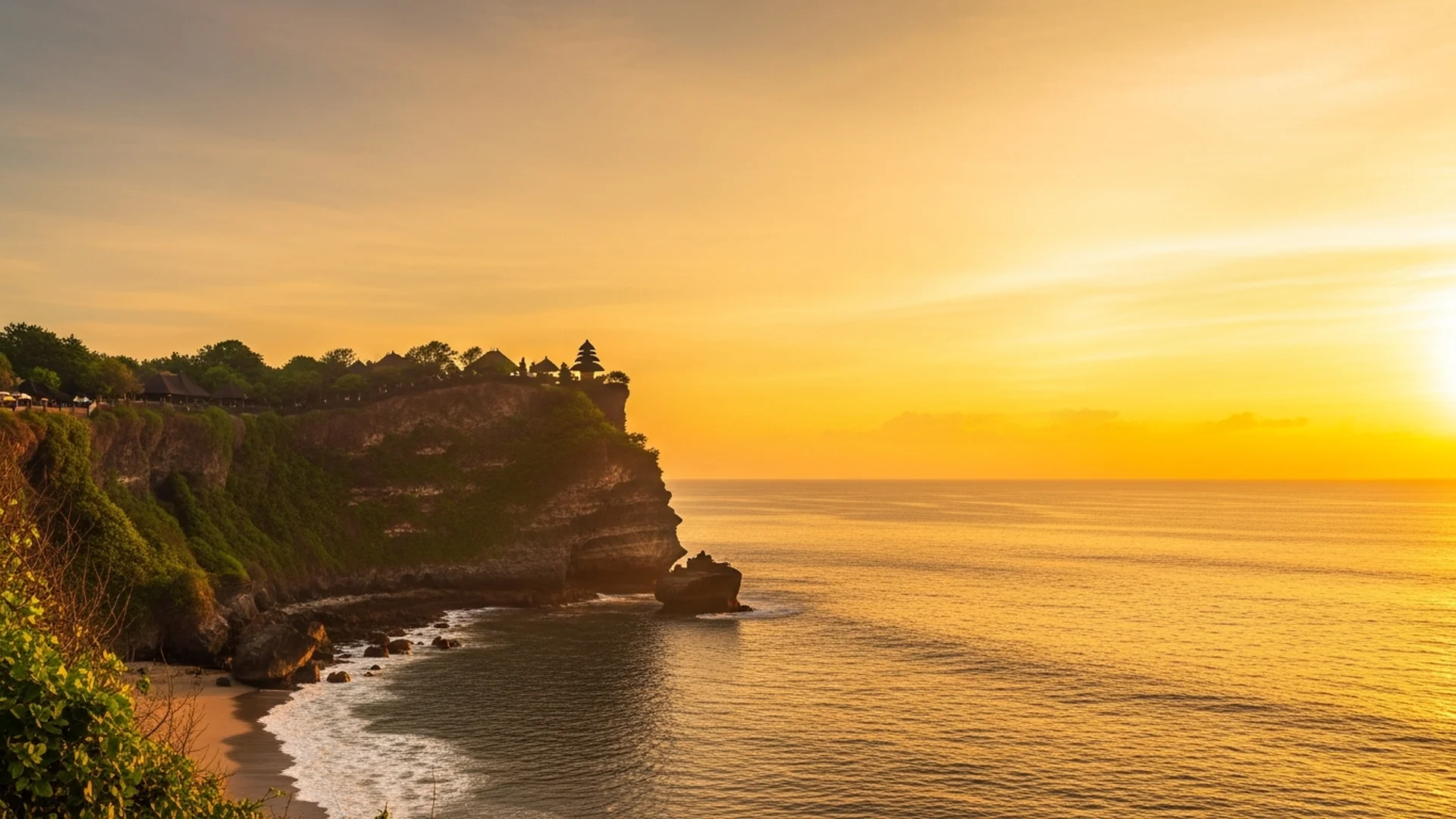 Bali coastline dramatic sunset with temple silhouette